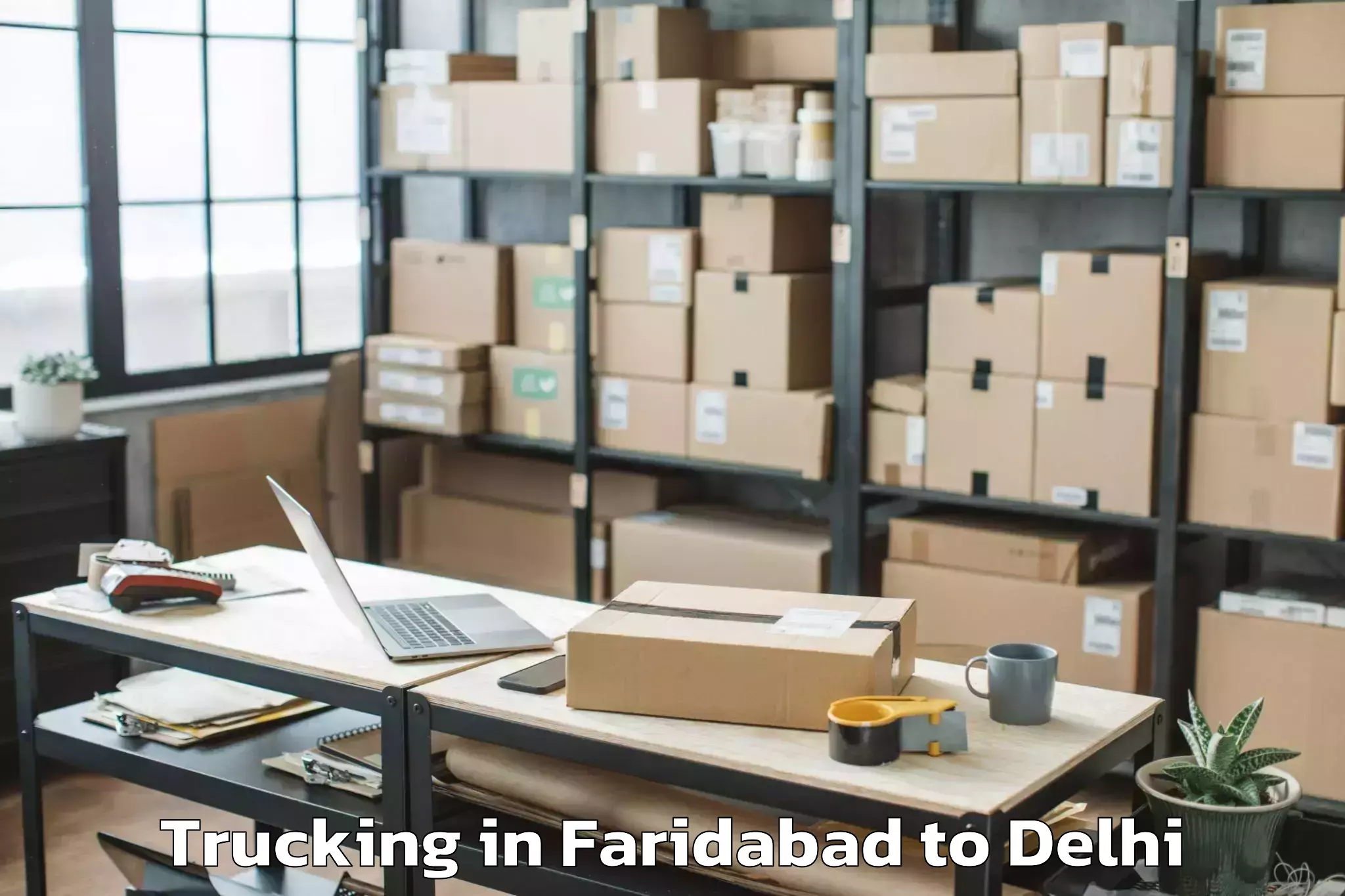 Faridabad to Dlf Promenade Mall Trucking Booking